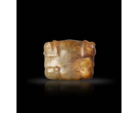 A NEOLITHIC YELLOW JADE AND RUSSET 'TIGER FACE' PENDANT  石家河文化 玉虎頭  Shijiahe Culture (2500–2000 BC)  W: 2.5cm