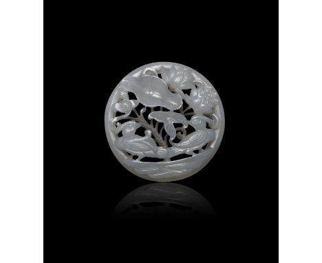 A CELADON JADE GREYNISH RETICULATED ‘LOTUS AND MANDARIN DUCKS’ PENDANT  清代 青玉透雕鸳鸯佩  China, Qing dynasty.  D: 4.9cm