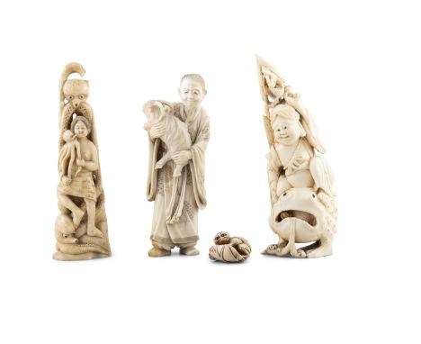 *A GROUP OF THREE CARVING OKIMONOS AND A NETSUKE  Comprising two figures in bones depicting Gama Sennin seated on the frog go