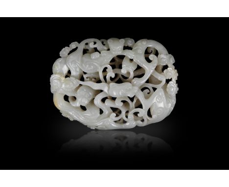 A CELADON WITH RUSSET ‘DRAGON’ JADE PLAQUE  清代 青玉透雕雲龍紋牌  China, 19th century.  Size: 10.5 x 7.6cm
