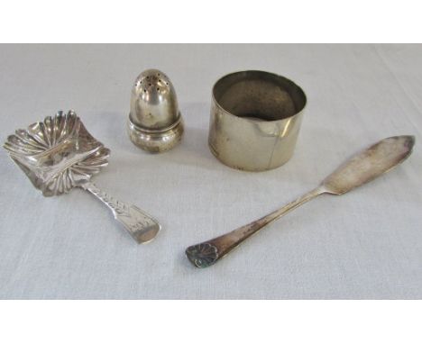 Silver napkin ring Sheffield 1935, caddy spoon Birmingham 1829, pepper pot Birmingham 1912 & a butter knife Sheffield hallmar