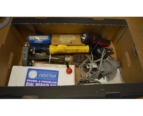 Various watchmakers tools including miniature anvils, magnets, torches, dial repair kit etc