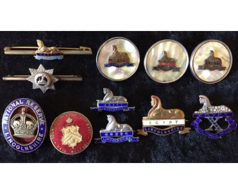 Lincolnshire Regiment badges including silver, tie pins, Lincolnshire National Reserve & County Borough of Grimsby Raid Welfa