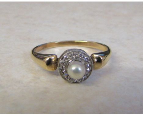 Tested as 9ct gold diamond and pearl ring size K