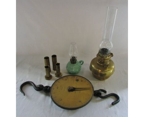 Brass paraffin lamp & one other, 4 shell cases & Salter spring balance scales