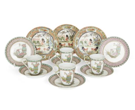 A Chinese famille rose tea set, mid-20th century, comprising four tea cups and five saucers, each painted with a basket of fl