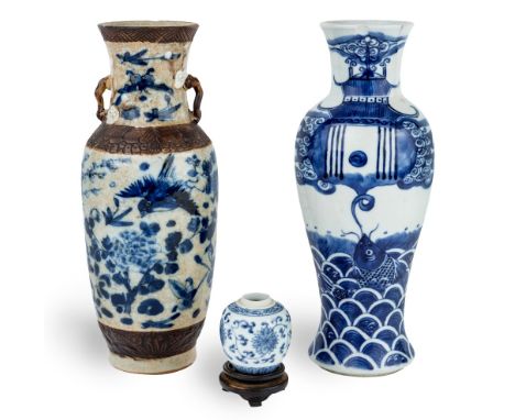 Two Chinese blue and white vases and a small jar, 19th century, the twin handled vase decorated with birds among flowers, the