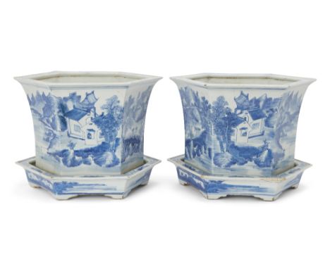 A pair of Chinese blue and white hexagonal jardinieres with stands, 18th century, each standing on bracket shaped feet with e