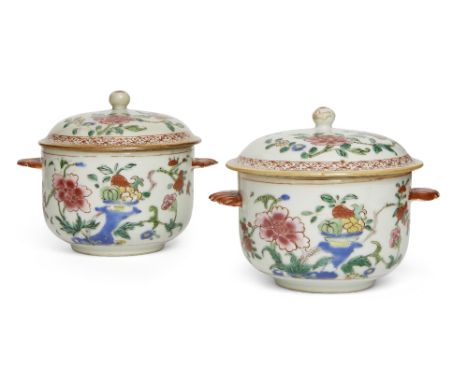 A pair of Chinese famille rose twin-handled circular bowls and covers, 18th century, raised on a short foot with deep rounded