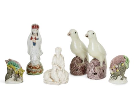 Six Chinese porcelain figures, 18th-20th century, comprising a Dehua figure of Guanyin, 14cm high, a pair of parrots, 19cm hi