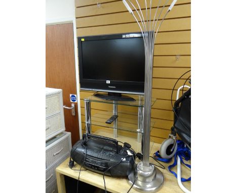 A Panasonic 28-inch flatscreen TV with stand & a modern eight-branch standard lamp etc E/T