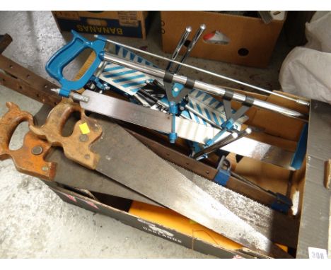 Box of vintage woodworking tools including hand saws, boxed Stanley hand drill etc