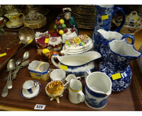 A tray of mixed china & flatware including a large ladle etc 