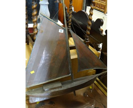 An unusual copper model yacht