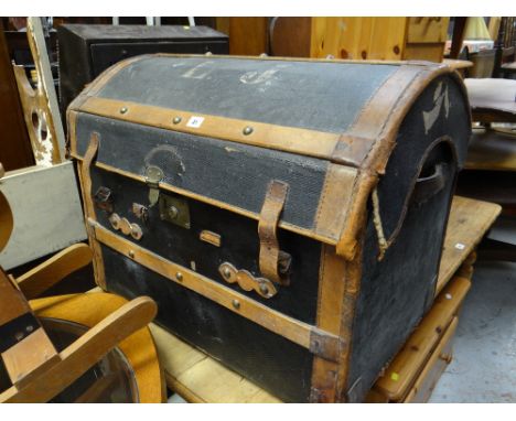 A good dome-top wicker & canvas trunk