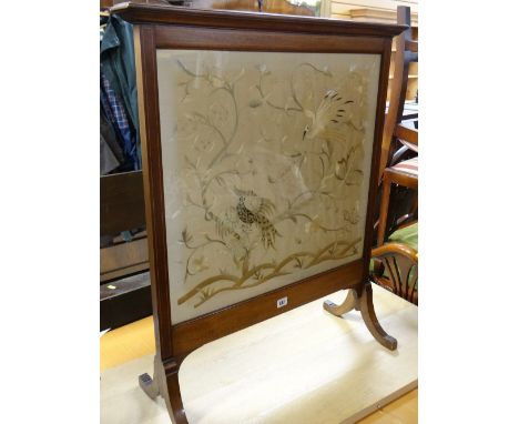 A good Edwardian mahogany & string decorated fire screen with silk decorated panel of Oriental birds