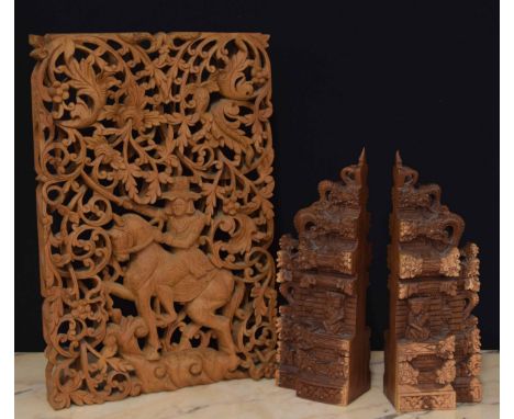 Pair of decorative an intricately&nbsp;carved wooden book&nbsp;ends,&nbsp;possibly Balinese, depicting Gapura, the gates that