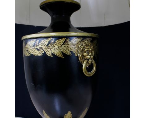 Decorative Toleware style composite table lamp, modelled as an urn with fixed cover and lion mask handles upon a square base,