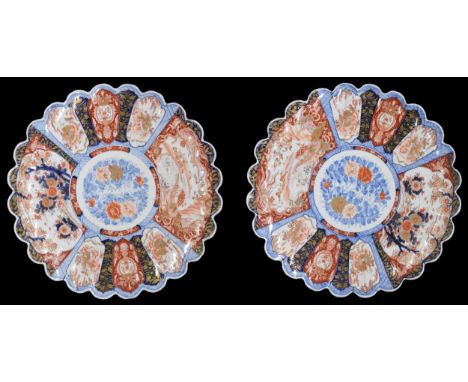 Impressive large pair of Japanese Imari porcelain fluted wall chargers,&nbsp;each with foliate designs tot he centre within a