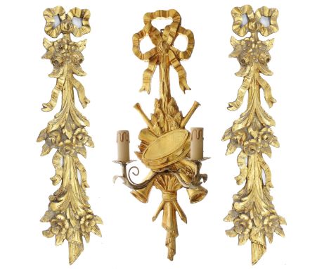 Pair of gold leaf gesso floral and foliate swag carved wall mounts, 29" high: together with gilt gesso twin-sconce wall light