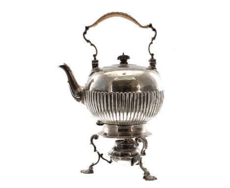 Victorian silver spirit kettle on stand, with a cane wrapped swing handle, and half reeded body, on a burner stand on three s