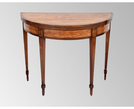 Georgian satinwood crossbanded fold-over demi-lune card table,&nbsp;the fold-over top enclosing a green baize lined interior 