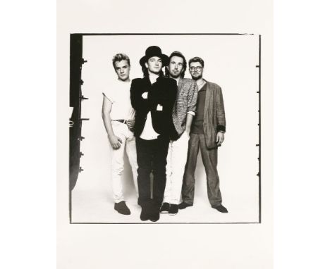 *DAVID BAILEY (b.1938)U2, LIVE AID, 13 JULY 1985Gelatin silver print, printed 1985, signed on reverse by David Bailey in penc