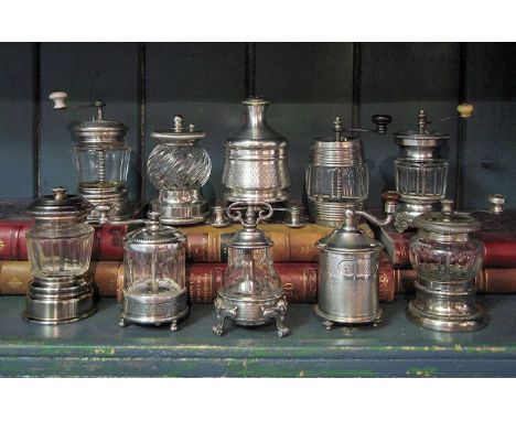 A COLLECTION OF TEN FRENCH PEPPER GRINDERS,1860-1900, a variety of designs in silver, pewter and nickel plate with glass bowl