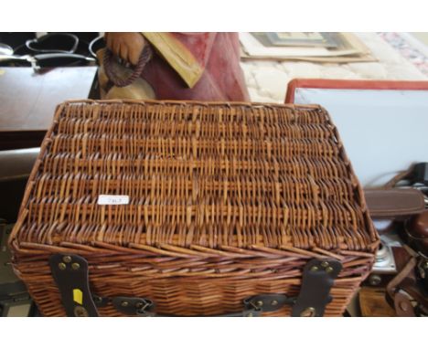 A wicker picnic hamper 