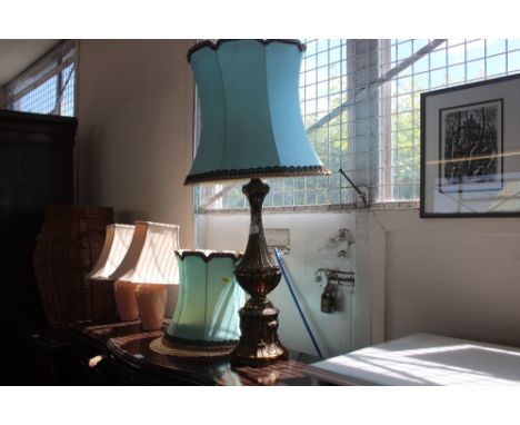 A brass table lamp and shade together with a pair of table lamps and shades