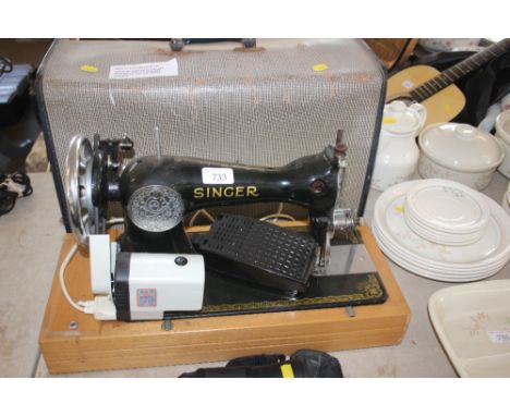A Singer electric sewing machine sold as collectors item