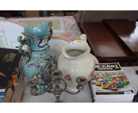 A silver plated candlestick together with a floral encrusted vase and a wash jug
