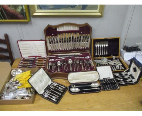 A large collection of silver plated flatware to include a near complete canteen and a cased set of part gilt spoons with frui