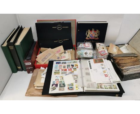 A large collection of British and International stamps, to include some first day cover albums, a Great Britain stamp album a