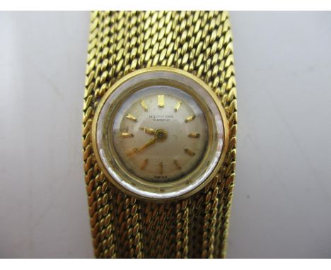 An IWC 18ct gold ladies manual wind wristwatch, circa 1958. The dial having baton markers and inscribed International Watch C