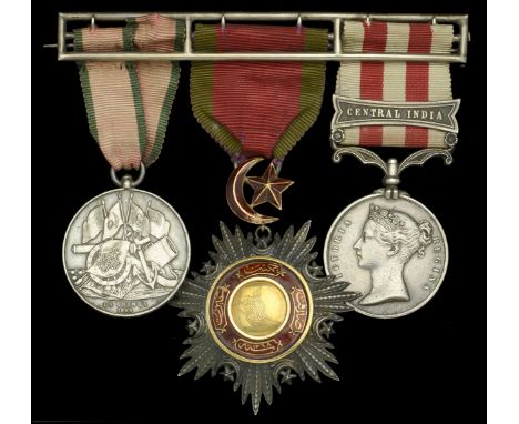 A scarce ‘Turkish Contingent’ and Indian Mutiny group of three awarded to Captain T. B. Heathorn, Bombay Artillery  Turkish C