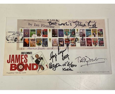 JAMES BOND; an Ian Fleming first day cover bearing the signatures of George Lazenby, Dame Diana Rigg, Timothy Walton and Mary