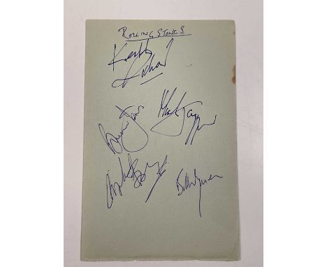 THE ROLLING STONES; a page from an autograph book bearing the signatures of Keith Richards, Mick Jagger, Brian Jones, Charlie