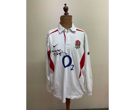 JONNY WILKINSON; a replica England rugby long sleeve shirt, signed and inscribed 'All the very best'.