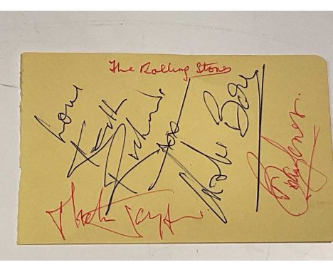 THE ROLLING STONES; a page from an autograph book bearing the signatures of Keith Richards, Mick Jagger, Brian Jones and Char