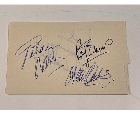 THE HOLLIES; a page from an autograph book bearing the signature of Allan Clarke, Graham Nash and Ray Stiles to one side, a f