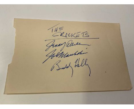THE CRICKETS; a page from an autograph book bearing three signatures including Buddy Holly.