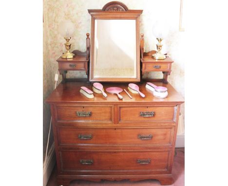 An Edwardian walnut dressing table by Howard & Son, rectangular mirror back with two drawers above two short and two long dra