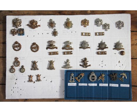 A large collection of British Army badges, to include; Kings Dragoon Guards, Queens Lancers, 19th PWO Hussars etc (approx 122