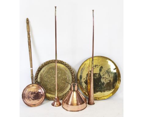 Two brass coffee table tops to include a leaf embossed example, 51.5cm diameter and another with Arabic script, 54cm diameter