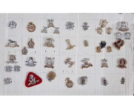 A collection of British Army badges, to include; Lifeguards, Blues and Royals, Royal Scotts Greys etc (approx 121 on 4 boards
