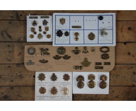 A collection of British Army badges and buttons, to include; Royal Welsh Fusilliers, Royal Irish Dragoon Guards etc (Qty in 1
