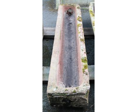 A red sandstone trough, 28cm H x 182cm W x 44cm D