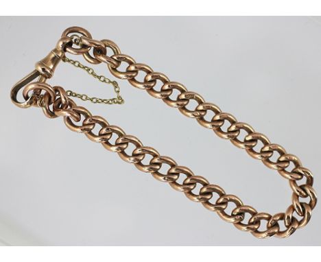 A 9ct gold curb link bracelet, Chester 1901, with attached swivel clasp and safety chain, total weight 27gms 