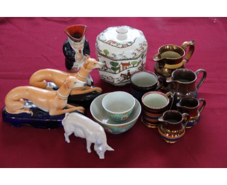 A Crown Staffordshire hunting Series biscuit jar and cover and two jardinières, two Staffordshire recumbent greyhounds, a tob
